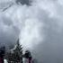 Massive Avalanche Tumbles Toward Skiers