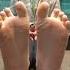 Girl Scrunching Her Feet