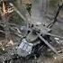 This Helicopter Has Crashed In The Jungle And Is Being Picked Up By A Chinook Helicopter