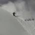 Snowboarding And Skis Running From An Avalanche