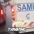 Biker Helps And Guids Ambulance Through A Traffic Jam